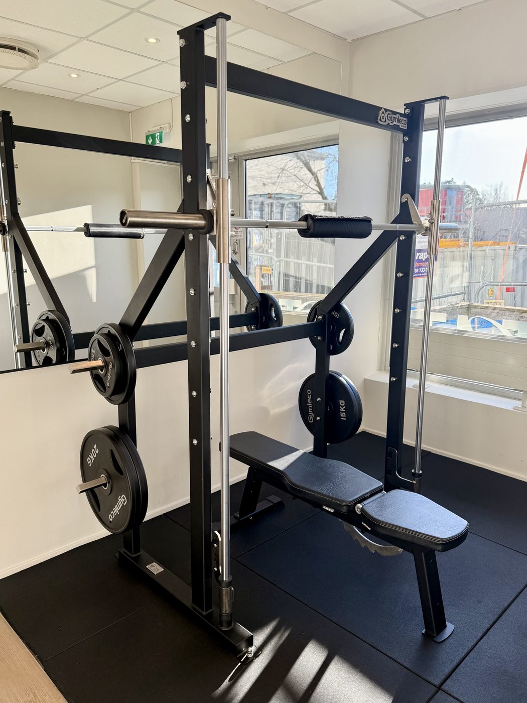 Smithmaskin med skivstång och vikter